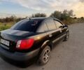 Черный Киа Рио, объемом двигателя 1.4 л и пробегом 168 тыс. км за 5600 $, фото 5 на Automoto.ua