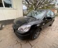 Черный Киа Рио, объемом двигателя 1.4 л и пробегом 250 тыс. км за 3399 $, фото 1 на Automoto.ua