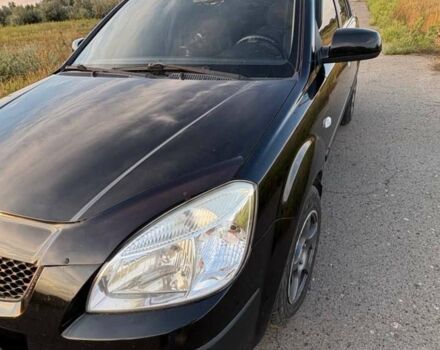 Чорний Кіа Ріо, об'ємом двигуна 1.4 л та пробігом 168 тис. км за 5500 $, фото 13 на Automoto.ua