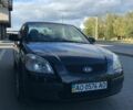 Черный Киа Рио, объемом двигателя 1.4 л и пробегом 291 тыс. км за 4200 $, фото 1 на Automoto.ua