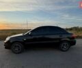 Черный Киа Рио, объемом двигателя 1.4 л и пробегом 168 тыс. км за 5500 $, фото 2 на Automoto.ua
