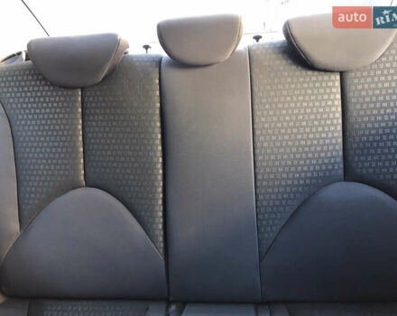 Черный Киа Рио, объемом двигателя 1.4 л и пробегом 291 тыс. км за 5500 $, фото 16 на Automoto.ua