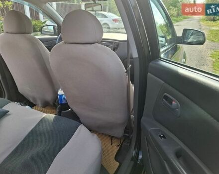 Черный Киа Рио, объемом двигателя 1.4 л и пробегом 156 тыс. км за 4800 $, фото 8 на Automoto.ua