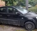 Чорний Кіа Ріо, об'ємом двигуна 1.4 л та пробігом 270 тис. км за 2198 $, фото 1 на Automoto.ua