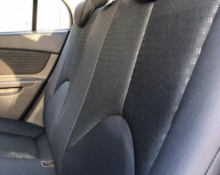 Черный Киа Рио, объемом двигателя 1.4 л и пробегом 291 тыс. км за 5500 $, фото 17 на Automoto.ua