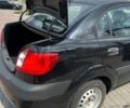 Черный Киа Рио, объемом двигателя 1.4 л и пробегом 146 тыс. км за 4350 $, фото 1 на Automoto.ua