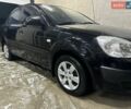 Черный Киа Рио, объемом двигателя 1.4 л и пробегом 216 тыс. км за 3300 $, фото 1 на Automoto.ua