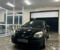 Чорний Кіа Ріо, об'ємом двигуна 1.4 л та пробігом 215 тис. км за 3112 $, фото 1 на Automoto.ua