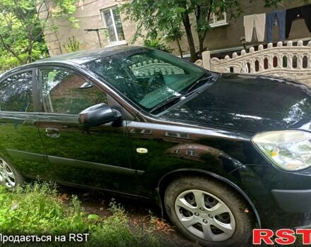 Черный Киа Рио, объемом двигателя 1.4 л и пробегом 260 тыс. км за 3900 $, фото 1 на Automoto.ua