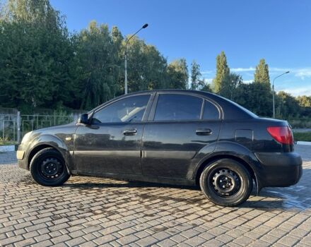 Черный Киа Рио, объемом двигателя 1.4 л и пробегом 259 тыс. км за 3300 $, фото 1 на Automoto.ua