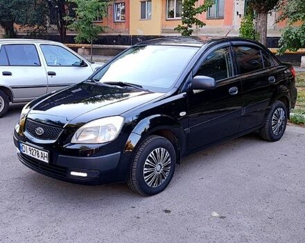 Чорний Кіа Ріо, об'ємом двигуна 1.4 л та пробігом 260 тис. км за 2800 $, фото 1 на Automoto.ua