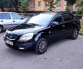 Чорний Кіа Ріо, об'ємом двигуна 1.4 л та пробігом 260 тис. км за 2800 $, фото 1 на Automoto.ua