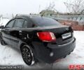 Чорний Кіа Ріо, об'ємом двигуна 1.4 л та пробігом 167 тис. км за 5550 $, фото 2 на Automoto.ua