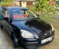 Черный Киа Рио, объемом двигателя 1.4 л и пробегом 210 тыс. км за 5500 $, фото 1 на Automoto.ua