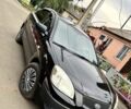 Черный Киа Рио, объемом двигателя 1.4 л и пробегом 252 тыс. км за 3889 $, фото 1 на Automoto.ua