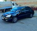 Черный Киа Рио, объемом двигателя 1.4 л и пробегом 260 тыс. км за 3100 $, фото 1 на Automoto.ua
