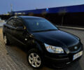 Черный Киа Рио, объемом двигателя 1.4 л и пробегом 150 тыс. км за 5400 $, фото 1 на Automoto.ua