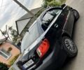 Черный Киа Рио, объемом двигателя 1.4 л и пробегом 252 тыс. км за 3889 $, фото 1 на Automoto.ua