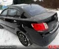 Чорний Кіа Ріо, об'ємом двигуна 1.4 л та пробігом 167 тис. км за 5550 $, фото 4 на Automoto.ua
