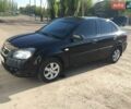 Черный Киа Рио, объемом двигателя 1.4 л и пробегом 216 тыс. км за 3500 $, фото 1 на Automoto.ua