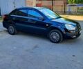 Черный Киа Рио, объемом двигателя 1.4 л и пробегом 260 тыс. км за 3100 $, фото 2 на Automoto.ua