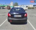 Чорний Кіа Ріо, об'ємом двигуна 1.4 л та пробігом 200 тис. км за 5500 $, фото 6 на Automoto.ua