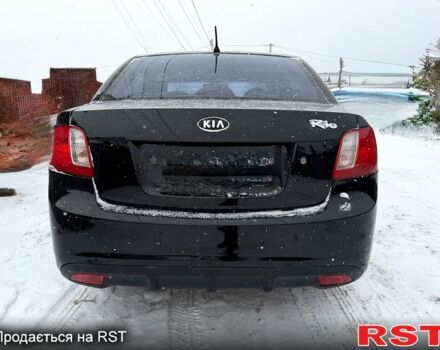 Чорний Кіа Ріо, об'ємом двигуна 1.4 л та пробігом 167 тис. км за 5550 $, фото 3 на Automoto.ua