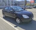 Чорний Кіа Ріо, об'ємом двигуна 1.4 л та пробігом 200 тис. км за 5500 $, фото 1 на Automoto.ua