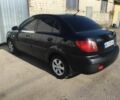 Черный Киа Рио, объемом двигателя 1.4 л и пробегом 211 тыс. км за 4000 $, фото 1 на Automoto.ua