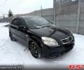 Чорний Кіа Ріо, об'ємом двигуна 1.4 л та пробігом 167 тис. км за 5550 $, фото 1 на Automoto.ua