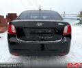 Чорний Кіа Ріо, об'ємом двигуна 1.4 л та пробігом 167 тис. км за 5550 $, фото 3 на Automoto.ua