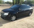 Черный Киа Рио, объемом двигателя 1.4 л и пробегом 215 тыс. км за 3502 $, фото 1 на Automoto.ua