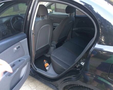 Чорний Кіа Ріо, об'ємом двигуна 1.6 л та пробігом 360 тис. км за 3900 $, фото 3 на Automoto.ua