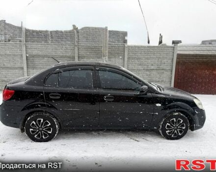 Чорний Кіа Ріо, об'ємом двигуна 1.4 л та пробігом 167 тис. км за 5550 $, фото 6 на Automoto.ua