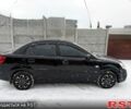 Чорний Кіа Ріо, об'ємом двигуна 1.4 л та пробігом 167 тис. км за 5550 $, фото 6 на Automoto.ua