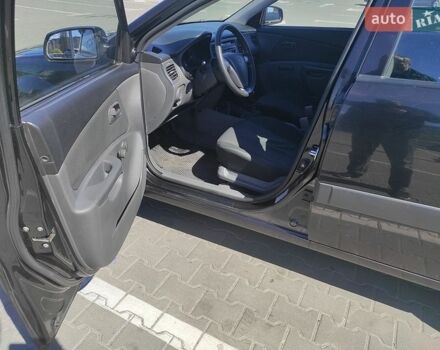 Чорний Кіа Ріо, об'ємом двигуна 1.4 л та пробігом 200 тис. км за 5500 $, фото 8 на Automoto.ua
