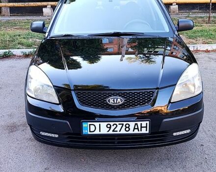 Чорний Кіа Ріо, об'ємом двигуна 1.4 л та пробігом 260 тис. км за 2800 $, фото 2 на Automoto.ua