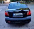 Чорний Кіа Ріо, об'ємом двигуна 1.4 л та пробігом 260 тис. км за 2800 $, фото 5 на Automoto.ua