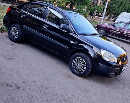 Чорний Кіа Ріо, об'ємом двигуна 1.4 л та пробігом 260 тис. км за 2800 $, фото 3 на Automoto.ua