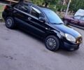 Чорний Кіа Ріо, об'ємом двигуна 1.4 л та пробігом 260 тис. км за 2800 $, фото 3 на Automoto.ua