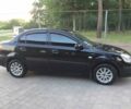 Чорний Кіа Ріо, об'ємом двигуна 1.6 л та пробігом 360 тис. км за 3900 $, фото 6 на Automoto.ua