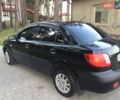 Черный Киа Рио, объемом двигателя 1.5 л и пробегом 360 тыс. км за 3900 $, фото 1 на Automoto.ua