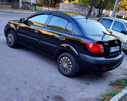 Чорний Кіа Ріо, об'ємом двигуна 1.4 л та пробігом 260 тис. км за 2800 $, фото 6 на Automoto.ua