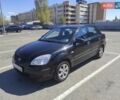Чорний Кіа Ріо, об'ємом двигуна 1.4 л та пробігом 200 тис. км за 5800 $, фото 1 на Automoto.ua