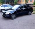 Чорний Кіа Ріо, об'ємом двигуна 1.4 л та пробігом 260 тис. км за 2800 $, фото 1 на Automoto.ua