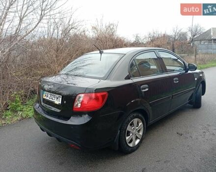 Черный Киа Рио, объемом двигателя 1.4 л и пробегом 186 тыс. км за 4800 $, фото 5 на Automoto.ua