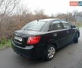 Черный Киа Рио, объемом двигателя 1.4 л и пробегом 186 тыс. км за 4800 $, фото 5 на Automoto.ua