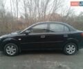 Черный Киа Рио, объемом двигателя 1.4 л и пробегом 186 тыс. км за 4800 $, фото 1 на Automoto.ua