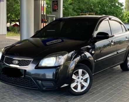 Чорний Кіа Ріо, об'ємом двигуна 1.4 л та пробігом 204 тис. км за 4600 $, фото 4 на Automoto.ua