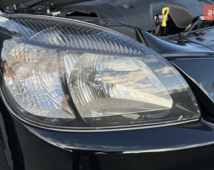 Чорний Кіа Ріо, об'ємом двигуна 1.5 л та пробігом 154 тис. км за 6900 $, фото 6 на Automoto.ua